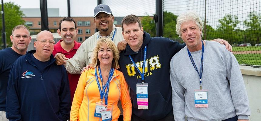 RWU alums coming together on campus in athletic gear